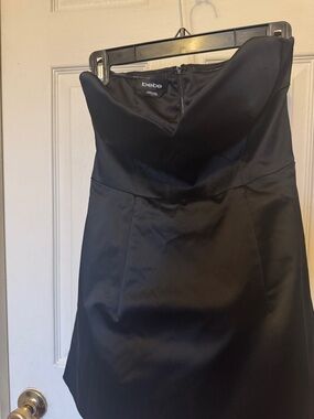 Size 6 BEBE strapless cocktail dress. Dress  has double layer slip underneath.